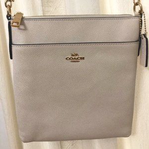 Coach Mini Rowan File Bag. Color gold-chalk
